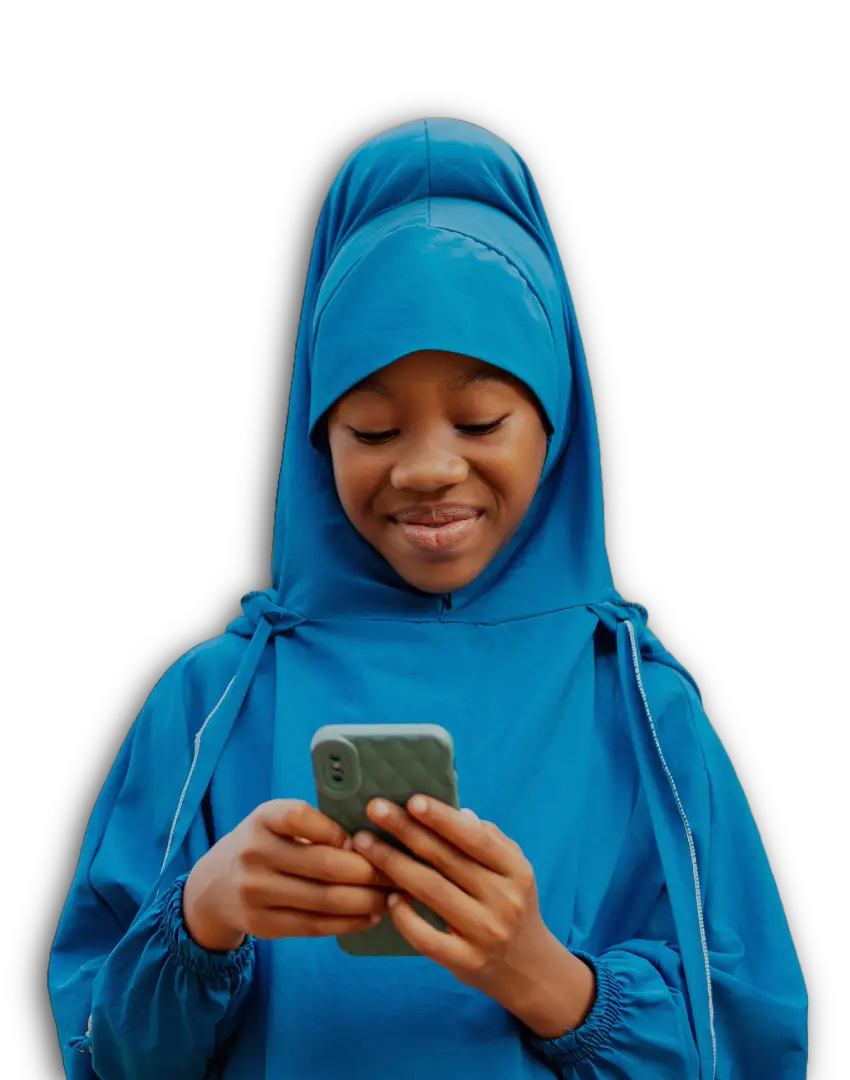 Student using a donated smartphone in Africa, featured in Tech On Hand's impact guide showing digital learning access